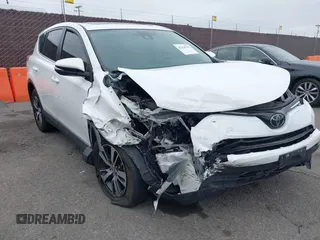 2018 Toyota RAV4 XLE with VIN JTMWFREV3JD116420, listed as a IAAI auction lot 42425707 with 91,403 mi miles and . Bid and sale history available at DreamBid. Image 1.