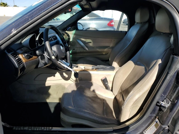 2006 BMW Z4 3.0i with VIN 4USBU33506LW69781, listed as a Copart auction lot 89412085 with 199,661 mi miles and Salvage Title. Bid and sale history available at carsss.com. Image 7.