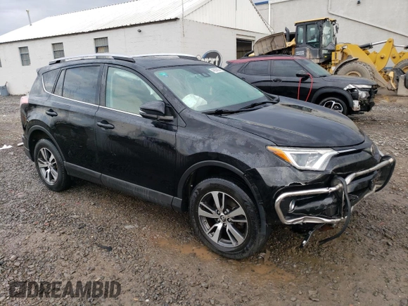 2018 Toyota RAV4 XLE with VIN 2T3RFREV6JW735352, listed as a Copart auction lot 46938025 with 73,229 mi miles and Salvage title. Bid and sale history available at DreamBid. Image 4.