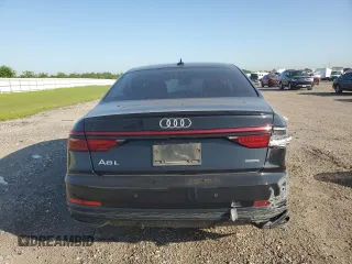 2021 Audi A8 z VIN WAU8DAF82MN007466, wystawiony jako Copart lot #52255715 z przebiegiem Nie podano mil oraz Szkoda całkowita • Salvage title. Historia ofert i sprzedaży dostępna na DreamBid. Obrazek 6.