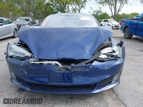 2016 Tesla Model S 70 with VIN 5YJSA1E10GF141725, listed as a IAAI auction lot 41878171 with 119,025 mi miles and . Bid and sale history available at DreamBid. Image 12.