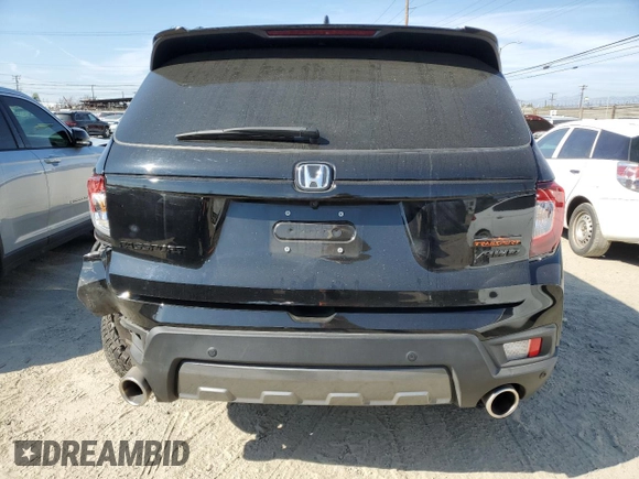 2024 Honda Passport TrailSport z VIN 5FNYF8H67RB010869, wystawiony jako Copart lot #50761425 z przebiegiem 5 720 mil mil oraz Szkoda całkowita • Salvage title. Historia ofert i sprzedaży dostępna na DreamBid. Obrazek 6.