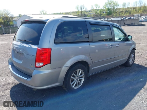 2015 Dodge Grand Caravan SXT with VIN 2C4RDGCG2FR540431, listed as a IAAI auction lot 42133044 with 245,977 mi miles and . Bid and sale history available at DreamBid. Image 4.