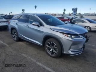 2022 Lexus RX with VIN JTJHZKEA0N2024877, listed as a Copart auction lot 41654965 with 14,003 mi miles and Salvage Title. Bid and sale history available at carsss.com. Image 4.
