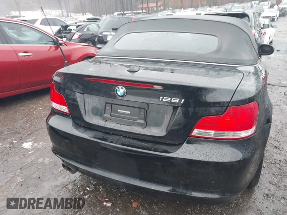 2011 BMW 1 Series 128i with VIN WBAUL7C52BVM79176, listed as a IAAI auction lot 41387249 with 99,145 mi miles and . Bid and sale history available at carsss.com. Image 17.