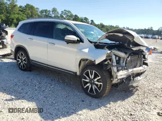 2021 Honda Pilot Touring 8-Passenger with VIN 5FNYF5H90MB001805, listed as a Copart auction lot 70215014 with 41,607 mi miles and Salvage Title. Bid and sale history available at DreamBid. Image 4.