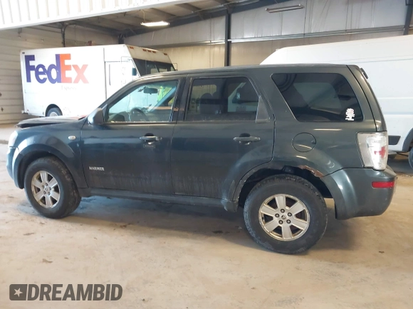 2008 Mercury Mariner with VIN 4M2CU81158KJ14013, listed as a IAAI auction lot 41305863 with 229,672 mi miles and . Bid and sale history available at DreamBid. Image 14.