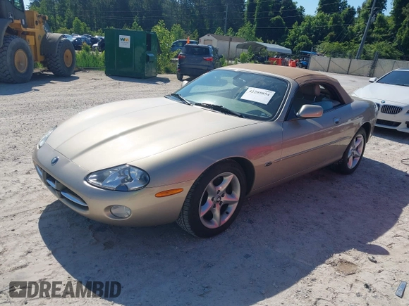 2002 Jaguar XK with VIN SAJDA42C32NA24378, listed as a IAAI auction lot 42205854 with 92,612 mi miles and . Bid and sale history available at DreamBid. Image 2.