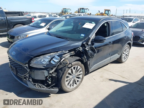 2020 Ford Escape Titanium Hybrid with VIN 1FMCU0DZ9LUC08090, listed as a IAAI auction lot 41674697 with 43,586 mi miles and . Bid and sale history available at DreamBid. Image 17.