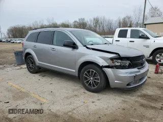 2017 Dodge Journey SE with VIN 3C4PDCAB9HT573188, listed as a Copart auction lot 51996425 with 121,978 mi miles and Salvage Title. Bid and sale history available at DreamBid. Image 4.