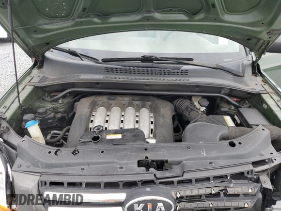 2005 Kia Sportage LX with VIN KNDJF723657074234, listed as a Copart auction lot 86792794 with 97,548 mi miles and Salvage Title. Bid and sale history available at carsss.com. Image 12.