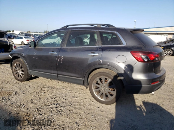 2015 Mazda CX-9 Grand Touring z VIN JM3TB3DV2F0456130, wystawiony jako Copart lot #60545095 z przebiegiem 120 892 mil mil oraz Szkoda całkowita • Salvage title. Historia ofert i sprzedaży dostępna na DreamBid. Obrazek 2.