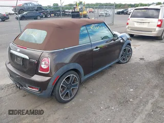 2011 MINI Convertible S with VIN WMWZP3C50BTX84044, listed as a IAAI auction lot 42669717 with Not provided miles and . Bid and sale history available at DreamBid. Image 4.