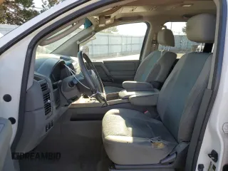 2007 Nissan Titan SE with VIN 1N6BA07A87N228312, listed as a Copart auction lot 82164424 with 206,471 mi miles and Clean title. Bid and sale history available at DreamBid. Image 7.
