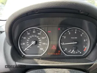 2011 BMW 1 Series 128i with VIN WBAUP7C57BVP21318, listed as a Copart auction lot 60479055 with 102,151 mi miles and Salvage title. Bid and sale history available at DreamBid. Image 9.