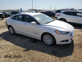 2015 Ford Fusion SE Hybrid with VIN 3FA6P0LU7FR154952, listed as a Copart auction lot 54192465 with 490,431 mi miles and Clean Title. Bid and sale history available at carsss.com. Image 4.