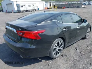 2018 Nissan Maxima SV with VIN 1N4AA6APXJC369633, listed as a IAAI auction lot 42256821 with 67,819 mi miles and . Bid and sale history available at DreamBid. Image 4.