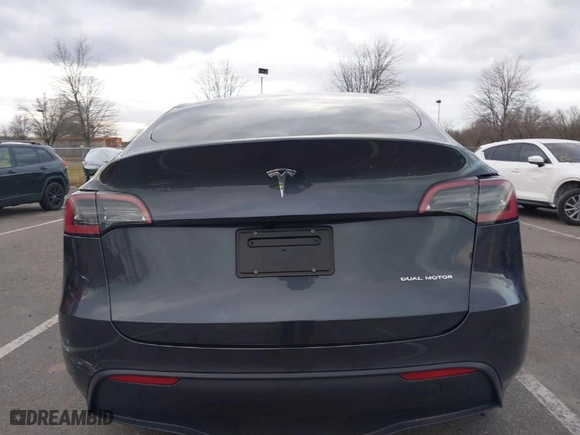 2024 Tesla Model Y Long Range with VIN 7SAYGDEE0RA330083, listed as a IAAI auction lot 41245099 with NaN miles. Bid and sale history available at carsss.com. Image 16.