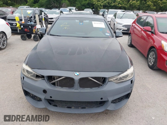 2014 BMW 4 Series 435i xDrive with VIN WBA3R5C53EK188805, listed as a IAAI auction lot 42365884 with 148,294 mi miles and . Bid and sale history available at DreamBid. Image 12.