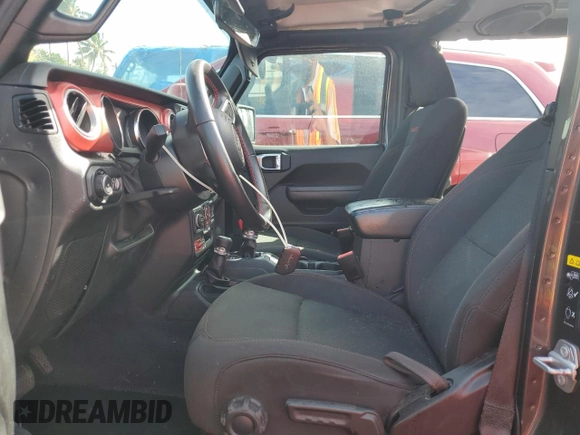 2022 Jeep Wrangler Unlimited Rubicon with VIN 1C4HJXFN9NW256461, listed as a Copart auction lot 43188065 with 26,944 mi miles and Salvage title. Bid and sale history available at DreamBid. Image 7.