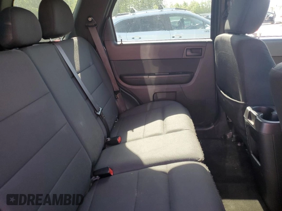 2012 Ford Escape XLT z VIN 1FMCU9DG1CKC54737, wystawiony jako Copart lot #59902055 z przebiegiem 206 067 mil mil oraz Szkoda całkowita • Salvage title. Historia ofert i sprzedaży dostępna na DreamBid. Obrazek 11.