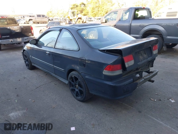 1999 Honda Civic HX with VIN 1HGEJ7120XL038544, listed as a IAAI auction lot 41425202 with 336,033 mi miles. Bid and sale history available at carsss.com. Image 3.