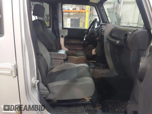 2007 Jeep Wrangler Unlimited X with VIN 1J4GA39167L147516, listed as a IAAI auction lot 41617025 with 119,572 mi miles and . Bid and sale history available at DreamBid. Image 5.