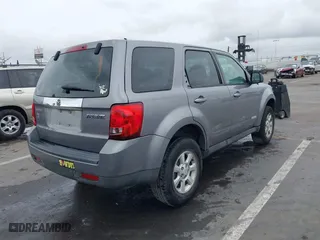2008 Mazda Tribute Sport with VIN 4F2CZ02Z28KM31700, listed as a IAAI auction lot 41736309 with 235,848 mi miles. Bid and sale history available at carsss.com. Image 4.