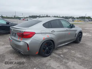 2019 BMW X6 M with VIN 5YMKW8C59K0Y75102, listed as a IAAI auction lot 41347277 with 37,635 mi miles. Bid and sale history available at carsss.com. Image 4.