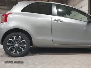 2008 Toyota Yaris with VIN JTDJT923085171725, listed as a IAAI auction lot 42090252 with 242,092 mi miles. Bid and sale history available at carsss.com. Image 6.