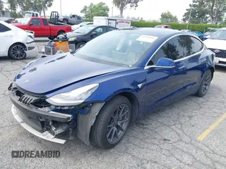 2020 Tesla Model 3 Standard Range Plus z VIN 5YJ3E1EA8LF785010, wystawiony jako IAAI lot #42130951 z przebiegiem 90 072 mil mil oraz . Historia ofert i sprzedaży dostępna na DreamBid. Obrazek 22.