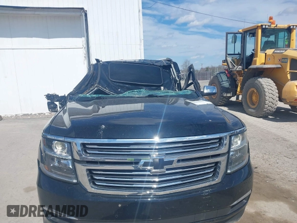 2015 Chevrolet Suburban LTZ with VIN 1GNSKKKC9FR280390, listed as a IAAI auction lot 41882449 with 80,499 mi miles and . Bid and sale history available at DreamBid. Image 6.