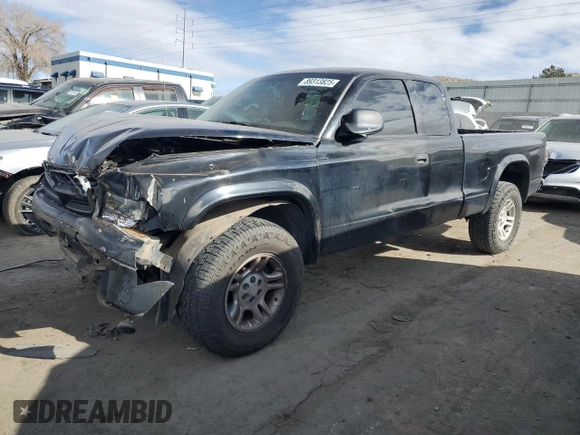 2004 Dodge Dakota SLT with VIN 1D7HG42N44S749267, listed as a Copart auction lot 89313825 with 215,047 mi miles and Salvage Title. Bid and sale history available at carsss.com. Image 1.