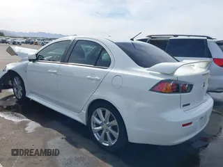 2013 Mitsubishi Lancer GT with VIN JA32U8FW7DU011260, listed as a IAAI auction lot 41233707 with 165,183 mi miles. Bid and sale history available at carsss.com. Image 3.