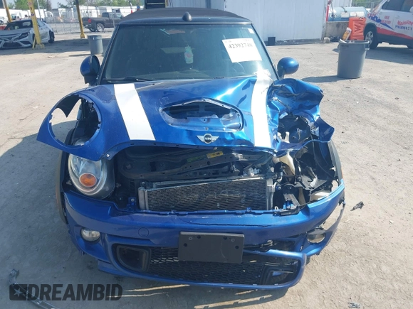 2013 MINI Convertible S with VIN WMWZP3C5XDT705613, listed as a IAAI auction lot 42392748 with 87,477 mi miles and . Bid and sale history available at DreamBid. Image 6.