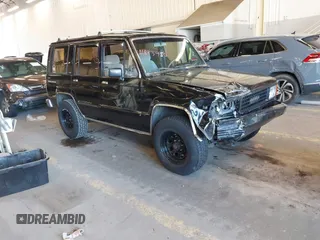 1991 Isuzu Trooper z VIN JACCH58R8M7902476, wystawiony jako IAAI lot #41893980 z przebiegiem 169 269 mil mil oraz . Historia ofert i sprzedaży dostępna na DreamBid. Obrazek 1.