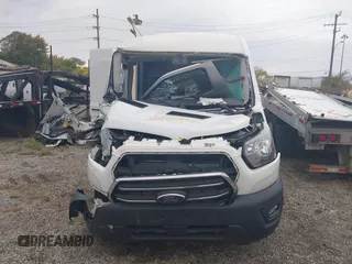 2020 Ford Transit Cargo z VIN 1FTBR1C82LKA61834, wystawiony jako IAAI lot #37802870 z przebiegiem Nie podano mil oraz . Historia ofert i sprzedaży dostępna na DreamBid. Obrazek 11.