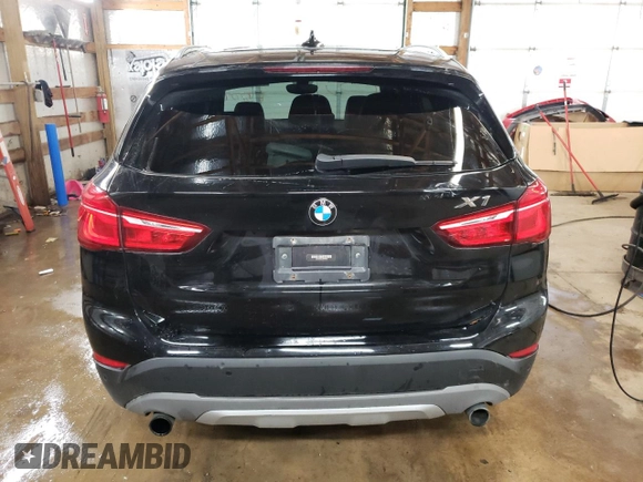2017 BMW X1 xDrive28i with VIN WBXHT3C34H5F87048, listed as a Copart auction lot 67545012 with 76,666 mi miles. Bid and sale history available at carsss.com. Image 6.