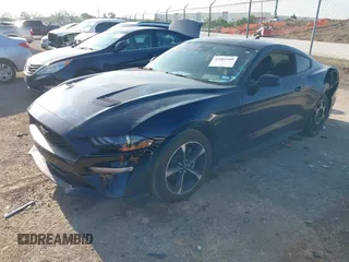 2021 Ford Mustang EcoBoost with VIN 1FA6P8TH0M5107683, listed as a IAAI auction lot 42084509 with 63,015 mi miles and . Bid and sale history available at DreamBid. Image 18.