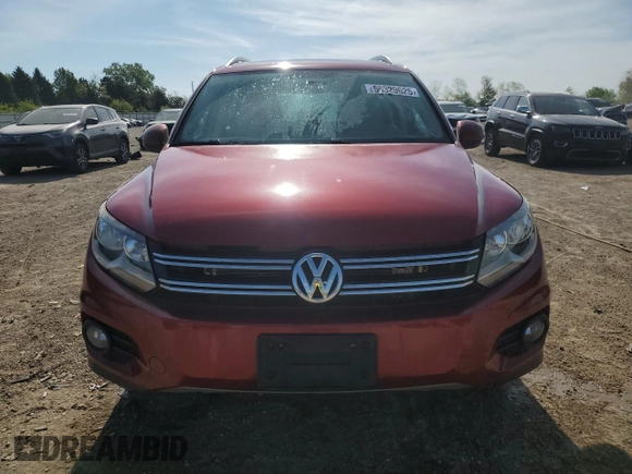 2014 Volkswagen Tiguan SE with VIN WVGAV3AX9EW038118, listed as a Copart auction lot 56329625 with 134,620 mi miles and Salvage title. Bid and sale history available at DreamBid. Image 5.