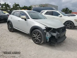 2017 Mazda CX-3 Grand Touring with VIN JM1DKFD76H0170333, listed as a Copart auction lot 43772595 with 59,693 mi miles and Salvage Title. Bid and sale history available at carsss.com. Image 4.