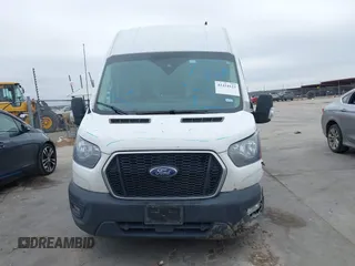 2021 Ford Transit Cargo with VIN 1FTBR1X82MKA98734, listed as a IAAI auction lot 41424123 with 84,453 mi miles and . Bid and sale history available at DreamBid. Image 12.
