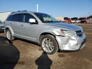 2013 Dodge Journey Crew with VIN 3C4PDCCG3DT642654, listed as a Copart auction lot 48866915 with 207,362 mi miles and Salvage title. Bid and sale history available at DreamBid. Image 4.