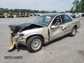 1999 Mercury Grand Marquis GS z VIN 2MEFM74W7XX706799, wystawiony jako Copart lot #54018375 z przebiegiem 167 498 mil mil oraz Szkoda całkowita • Salvage title. Historia ofert i sprzedaży dostępna na DreamBid. Obrazek 1.