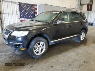 2009 Volkswagen Touareg VR6 z VIN WVGBE77L29D015958, wystawiony jako Copart lot #52019505 z przebiegiem 179 339 mil mil oraz Czysty tytuł • Clean title. Historia ofert i sprzedaży dostępna na DreamBid. Obrazek 1.