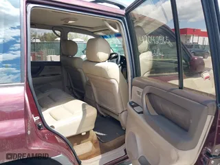 2002 Toyota Land Cruiser with VIN JTEHT05J422022565, listed as a IAAI auction lot 42042565 with 550,000 mi miles. Bid and sale history available at carsss.com. Image 8.
