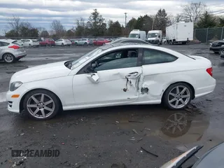 2015 Mercedes-Benz C-Class C 250 with VIN WDDGJ4HB6FG401261, listed as a IAAI auction lot 41483848 with 124,915 mi miles. Bid and sale history available at carsss.com. Image 14.