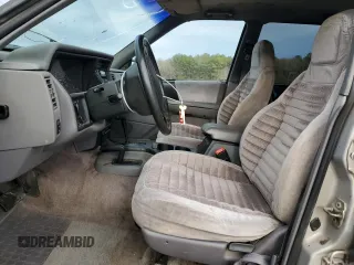 1995 Jeep Grand Cherokee Laredo with VIN 1J4GZ58S7SC517783, listed as a Copart auction lot 43057145 with 225,273 mi miles and Salvage Title. Bid and sale history available at carsss.com. Image 7.