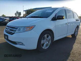 2011 Honda Odyssey Touring с VIN 5FNRL5H96BB002421, выставлен на аукционе IAAI как лот 42297384 с пробегом 128 472 миль миль и . История ставок и продаж доступна на DreamBid. Изображение 18.