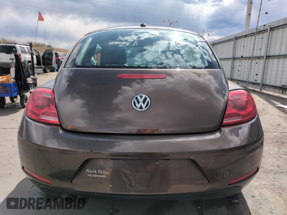 2013 Volkswagen Beetle with VIN 3VWHX7AT8DM603424, listed as a Copart auction lot 51019185 with 136,196 mi miles and Salvage Title. Bid and sale history available at DreamBid. Image 6.